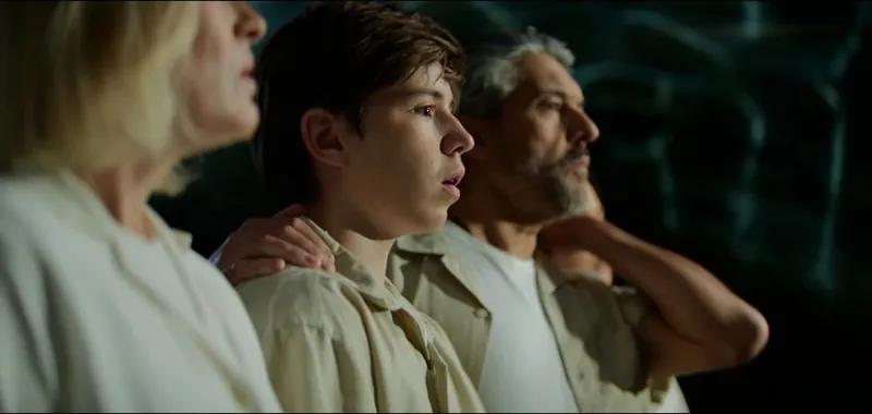 A family looks up in wonder