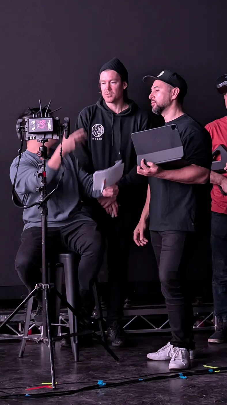 Talking through a shot with an iPad on a dark stage