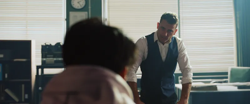 Two actors in an office set